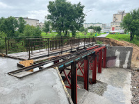 Выполнена большая часть работ по ремонту мостика через речку Дачную 