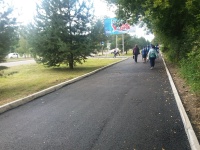 В Арсеньеве идет асфальтирование тротуара по нечетной стороне ул. Жуковского на участке от ул. Островского до ул. Садовой