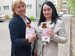 Сотрудники Центральной городской библиотеки и волонтёры приняли участие во Всероссийской акцию «Георгиевская ленточка»